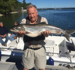 charlie with 13.8 lb lake trout 33 inch long skaneateles lake mid sept 2016